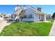 Charming condo with well-maintained lawn and appealing exterior in a sunny neighborhood at 17003 E Tennessee Dr # 209, Aurora, CO 80017