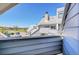 A view of neighborhood condos from the balcony, featuring a blue sky at 17003 E Tennessee Dr # 209, Aurora, CO 80017