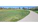 This spacious green space has a walking path alongside it and has plenty of room to play at 17003 E Tennessee Dr # 209, Aurora, CO 80017