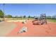 The community playground has a swingset, slide, and climbing area with plenty of room to run at 17003 E Tennessee Dr # 209, Aurora, CO 80017