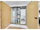 A look at the unit's utility closet with modern washer, dryer, and water heater at 17003 E Tennessee Dr # 209, Aurora, CO 80017