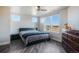 Bright bedroom featuring gray wood floors, large windows, and a view at 19647 Guildford Ct, Monument, CO 80132