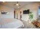 Bedroom featuring hardwood floors, a modern ceiling fan, and views from the window at 19647 Guildford Ct, Monument, CO 80132
