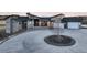 Attractive exterior showcasing architectural design with stone accents and a circular driveway at 19647 Guildford Ct, Monument, CO 80132