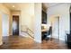 Hallway features hardwood floors, modern railings, and a cozy office nook at 19647 Guildford Ct, Monument, CO 80132