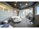 Stylish outdoor patio featuring comfortable lounge seating and contemporary design at 19647 Guildford Ct, Monument, CO 80132