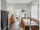 Bright bathroom with a separate shower, soaking tub, and doorway view to bedroom at 8501 Hackamore Rd, Littleton, CO 80125