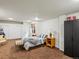 Bright bedroom with closet space, a double bed, and ample space for relaxation at 8501 Hackamore Rd, Littleton, CO 80125