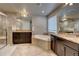 Luxurious bathroom with a large soaking tub, double vanity, and shower at 15726 E Otero Cir, Centennial, CO 80112