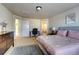 Main bedroom with a king-size bed, and an en-suite bathroom at 15726 E Otero Cir, Centennial, CO 80112