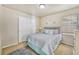 Spacious bedroom with a queen bed, window, and closet at 15726 E Otero Cir, Centennial, CO 80112