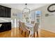 Bright dining room with hardwood floors and access to backyard at 15726 E Otero Cir, Centennial, CO 80112