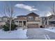 Two-story house with a large front yard, driveway, and attached garage at 15726 E Otero Cir, Centennial, CO 80112