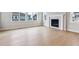Cozy living room featuring a fireplace and large windows offering natural light at 1825 Morgan Dr, Erie, CO 80516