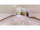 Spacious bonus room with carpet flooring and natural light at 11475 Us Highway 85, Littleton, CO 80125