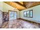 Inviting dining room with tile floors, wood ceiling, and large windows for natural light at 11475 Us Highway 85, Littleton, CO 80125