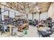 Spacious garage interior with ample workspace and storage for tools and equipment at 11475 Us Highway 85, Littleton, CO 80125