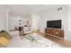 Cozy living room with comfortable seating, a modern TV console, and stylish decor at 444 17Th St # 802, Denver, CO 80202