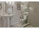 Bathroom featuring tiled floors and updated shower at 9851 Castle Ridge Cir, Highlands Ranch, CO 80129