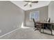 Bedroom featuring a modern desk and chair with natural light at 9851 Castle Ridge Cir, Highlands Ranch, CO 80129