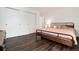 Spacious bedroom with wood floors and a closet at 1825 S Pitkin Cir # 10, Aurora, CO 80017