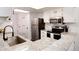 Modern kitchen featuring white cabinets, granite countertops, and stainless steel appliances for efficient cooking at 1825 S Pitkin Cir # 10, Aurora, CO 80017