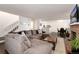 Spacious living room with an open layout, seamlessly connecting to the dining area and kitchen for easy interaction at 1825 S Pitkin Cir # 10, Aurora, CO 80017