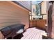 Cozy patio with wood deck and outdoor grill, perfect for entertaining guests at 1825 S Pitkin Cir # 10, Aurora, CO 80017