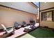 Relaxing patio boasts comfortable seating, string lights, and a peaceful atmosphere at 1825 S Pitkin Cir # 10, Aurora, CO 80017