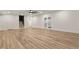 Basement featuring laminate flooring and access to the upper level at 5723 Berry Ridge Way, Castle Rock, CO 80104