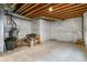 Unfinished basement with exposed ceiling and concrete floor, offering potential for customization at 5723 Berry Ridge Way, Castle Rock, CO 80104