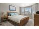 Cozy bedroom with a large bay window and comfortable furnishings at 5723 Berry Ridge Way, Castle Rock, CO 80104