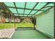 Covered patio with concrete flooring, green covering and access to backyard at 3631 W 79Th Ave # A2, Westminster, CO 80030