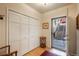 Inviting entryway with closet, hardwood floors, and convenient access to the outdoors at 4192 Timbervale Dr, Evergreen, CO 80439