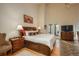 Spacious main bedroom with tall ceilings, and lots of natural light at 4192 Timbervale Dr, Evergreen, CO 80439