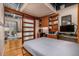 Bedroom with desk and sliding door to living room, offering flexible living space at 1435 Wazee St # 403, Denver, CO 80202