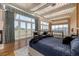 Bright main bedroom with balcony access and city views at 1435 Wazee St # 403, Denver, CO 80202