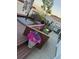 Enjoyable rooftop patio with planter with colorful flowers, grill, and outdoor seating, ideal for relaxation at 1435 Wazee St # 403, Denver, CO 80202