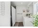 Clean bathroom with white vanity, shower, and tile floor at 8520 W 32Nd Pl, Wheat Ridge, CO 80033