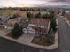 Aerial view of the property highlights the well-maintained landscaping and neighborhood at 1808 Southard St, Erie, CO 80516