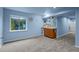 Basement area featuring a kitchenette and a window with a serene view at 1808 Southard St, Erie, CO 80516