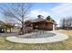 Community clubhouse with bike racks, playground, seating, and a charming brick exterior at 1808 Southard St, Erie, CO 80516