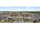 Aerial view of the shopping center with lots of parking and a variety of retail stores and restaurants at 1518 Sepia Ave, Longmont, CO 80501