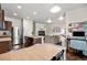 Open concept kitchen and living area perfect for entertaining and everyday living at 1518 Sepia Ave, Longmont, CO 80501