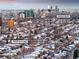 Aerial view of city with a neighborhood in the foreground at 1817 E Center Ave, Denver, CO 80209