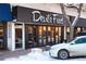 Exterior shot of Devil's Food restaurant with its distinctive signage and storefront appeal at 1817 E Center Ave, Denver, CO 80209