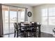 Bright dining area with outdoor access through glass doors, perfect for entertaining at 14537 Honolulu Cir, Parker, CO 80134