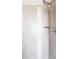 Walk-in shower with contemporary tile and rainfall shower head at 14537 Honolulu Cir, Parker, CO 80134