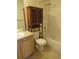 Bathroom featuring a toilet, vanity, sink, and shower with a tub at 559 Alton Way # E, Denver, CO 80230