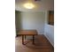 The dining room features hardwood floors and neutral paint to create a welcoming atmosphere for meals at 559 Alton Way # E, Denver, CO 80230
